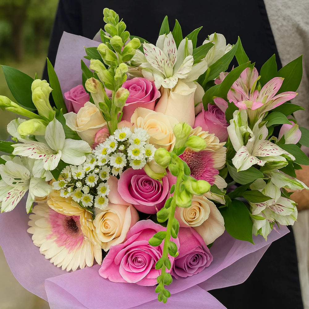 Fresh flower bouquet with roses and other blooms