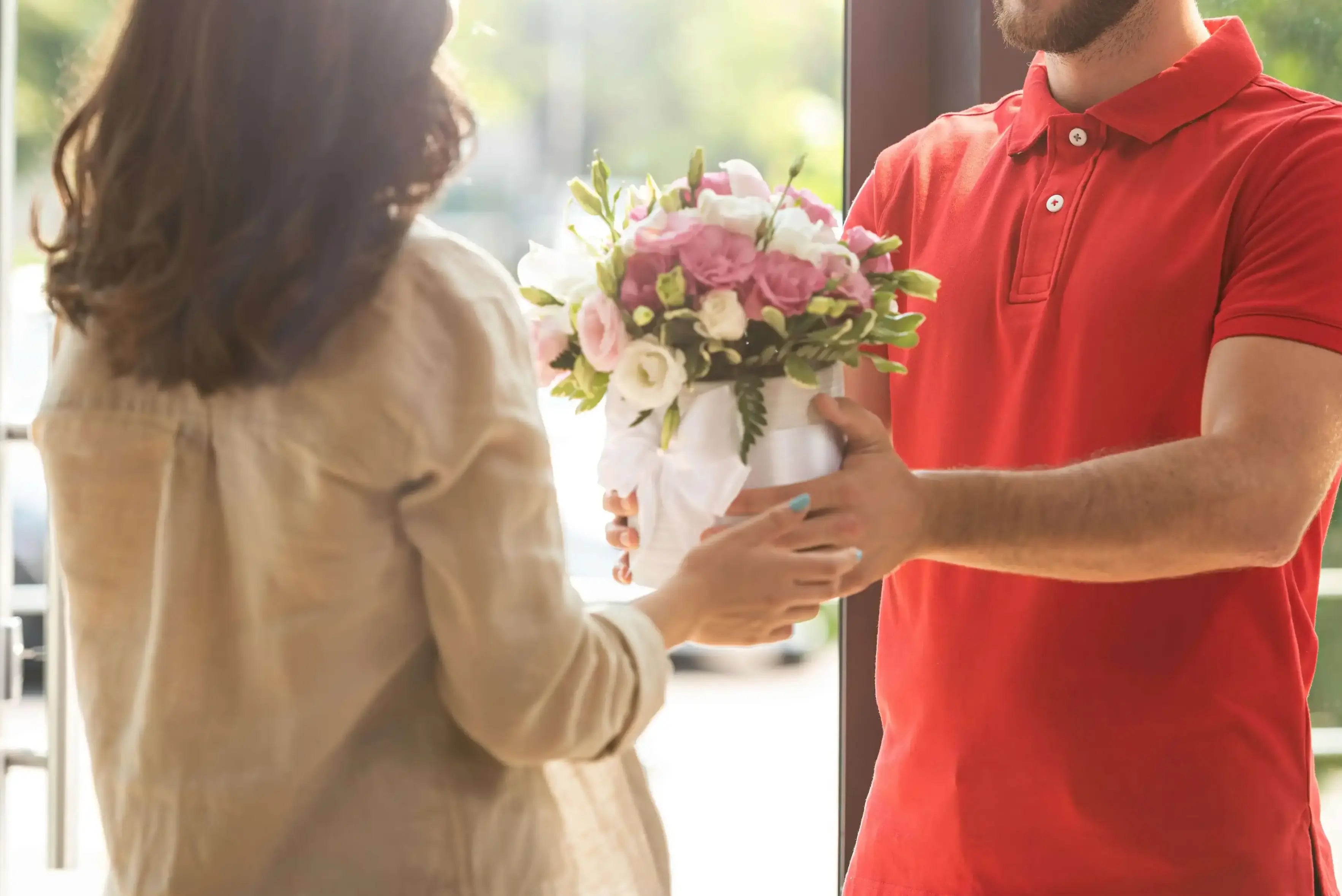 Handing bouquet to customer