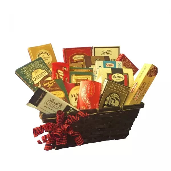 A basket filled with assorted chocolate bars and a red bow.
